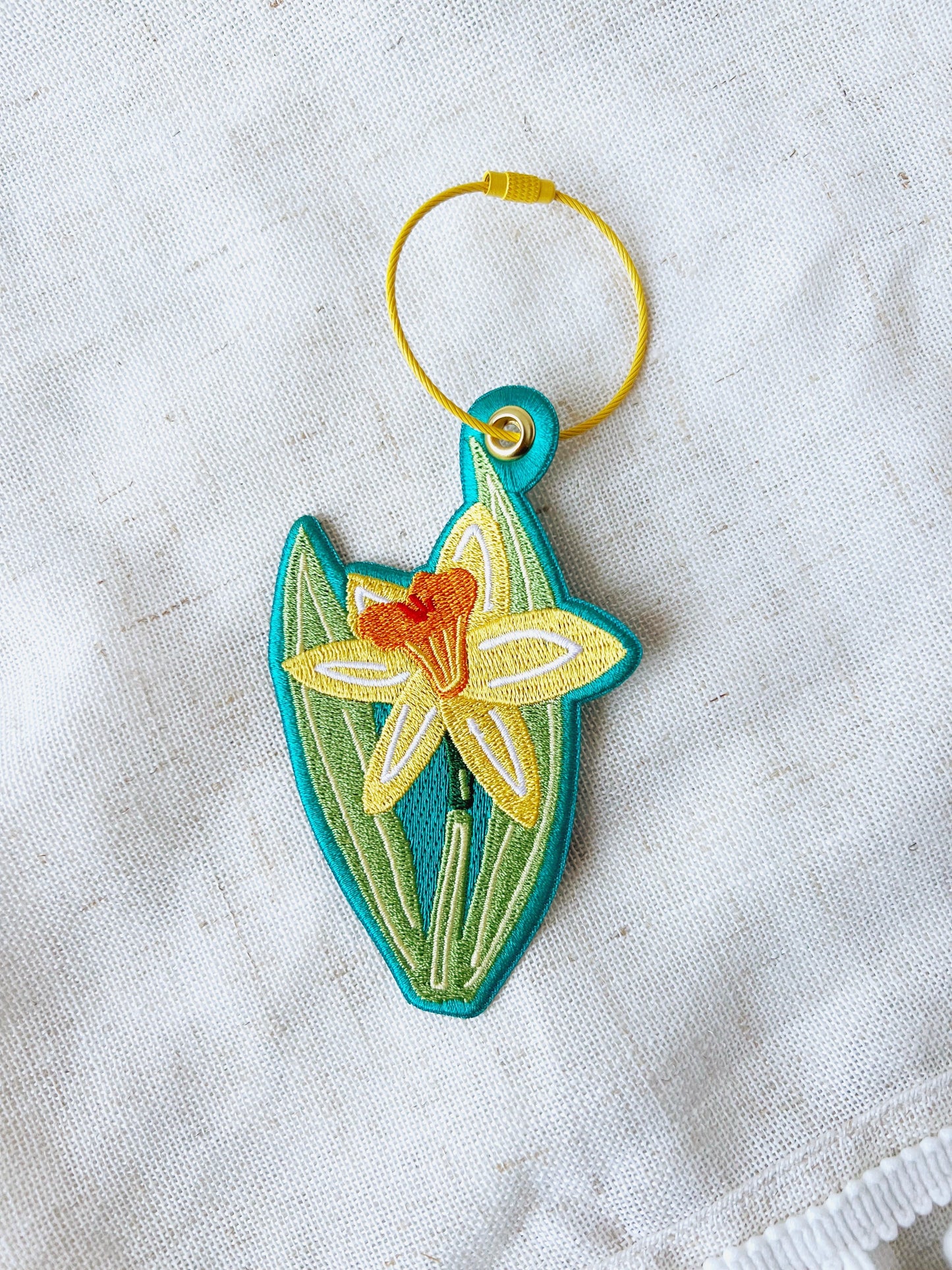 Daffodil embroidered bag charm keychain