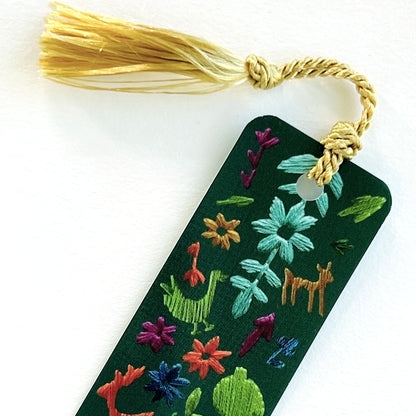 gold tassel on dark green bookmark with embroidered animals and flowers by Rikrack